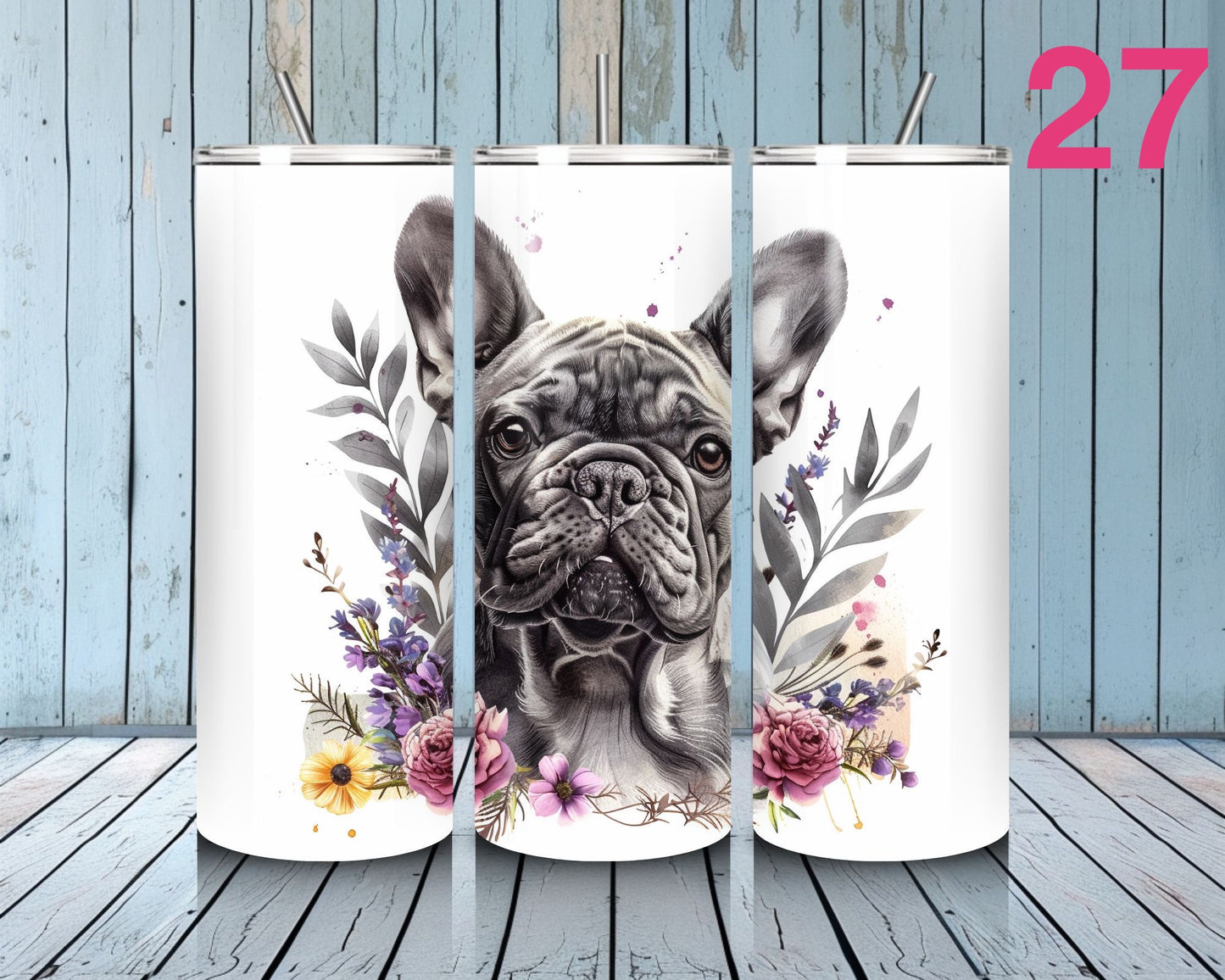 Three tumblers with a dog illustration and floral design on a wooden surface.