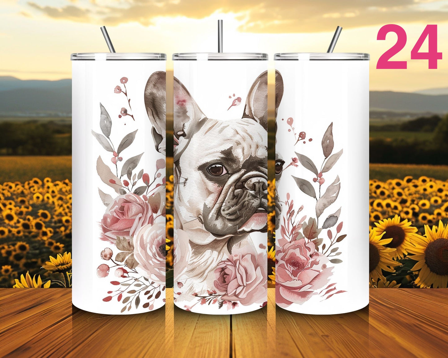 Three white tumblers with a dog and floral design on a wooden surface with sunflower field background.
