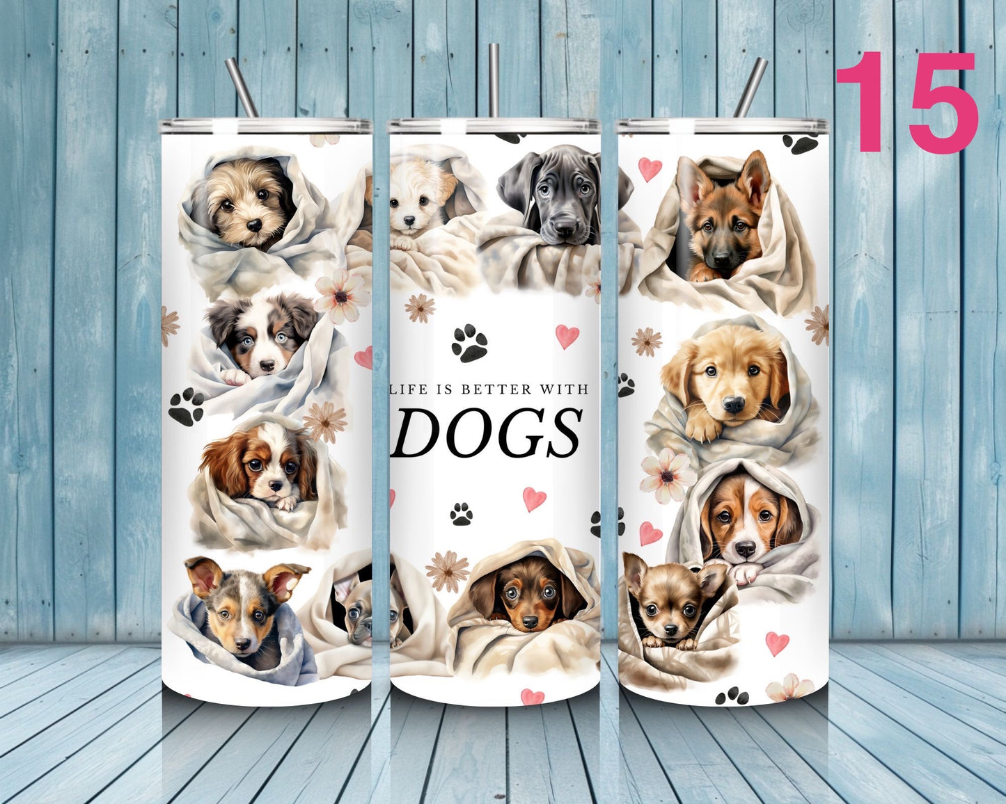 Three tumblers with images of puppies and text 'Life is better with dogs' on a wooden surface.