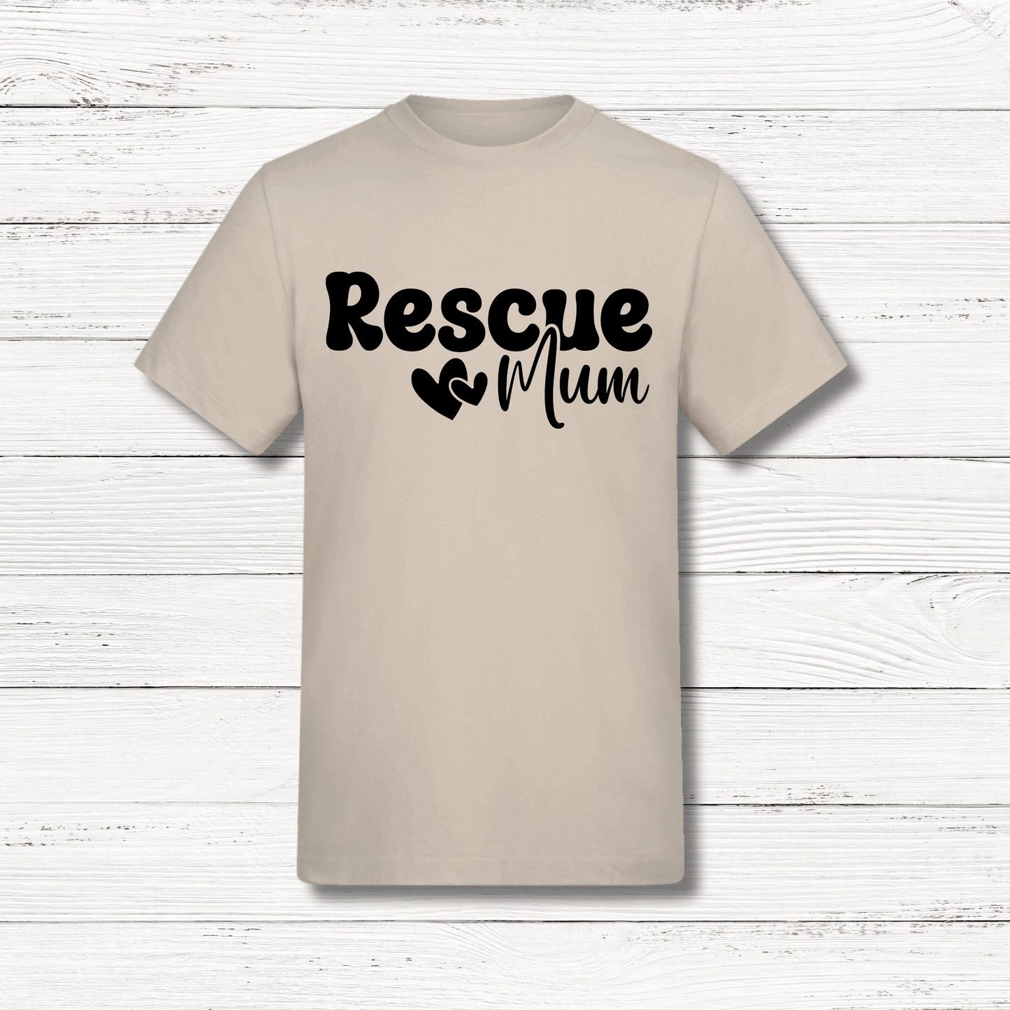 Beige t-shirt with 'Rescue Mum' text on a wooden surface