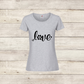 Gray t-shirt with 'love' and paw print design on a wooden surface