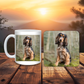 Mug and coaster set with a dog photo on a wooden surface with a sunset background