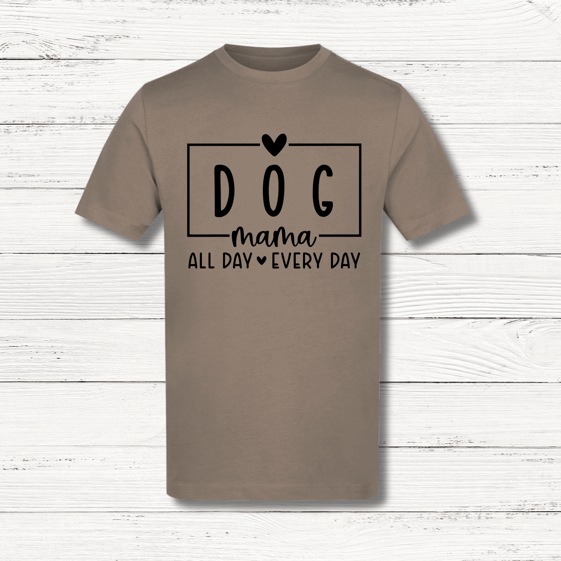 Brown t-shirt with 'DOG mama ALL DAY EVERY DAY' text on a wooden surface