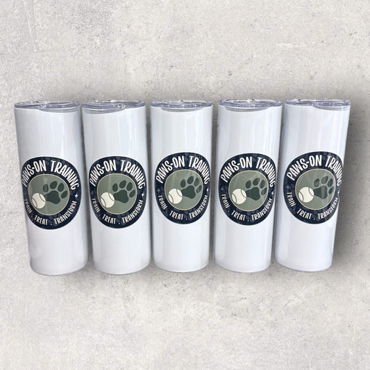 Five white tumblers with 'Paws on Training' logo on a gray background