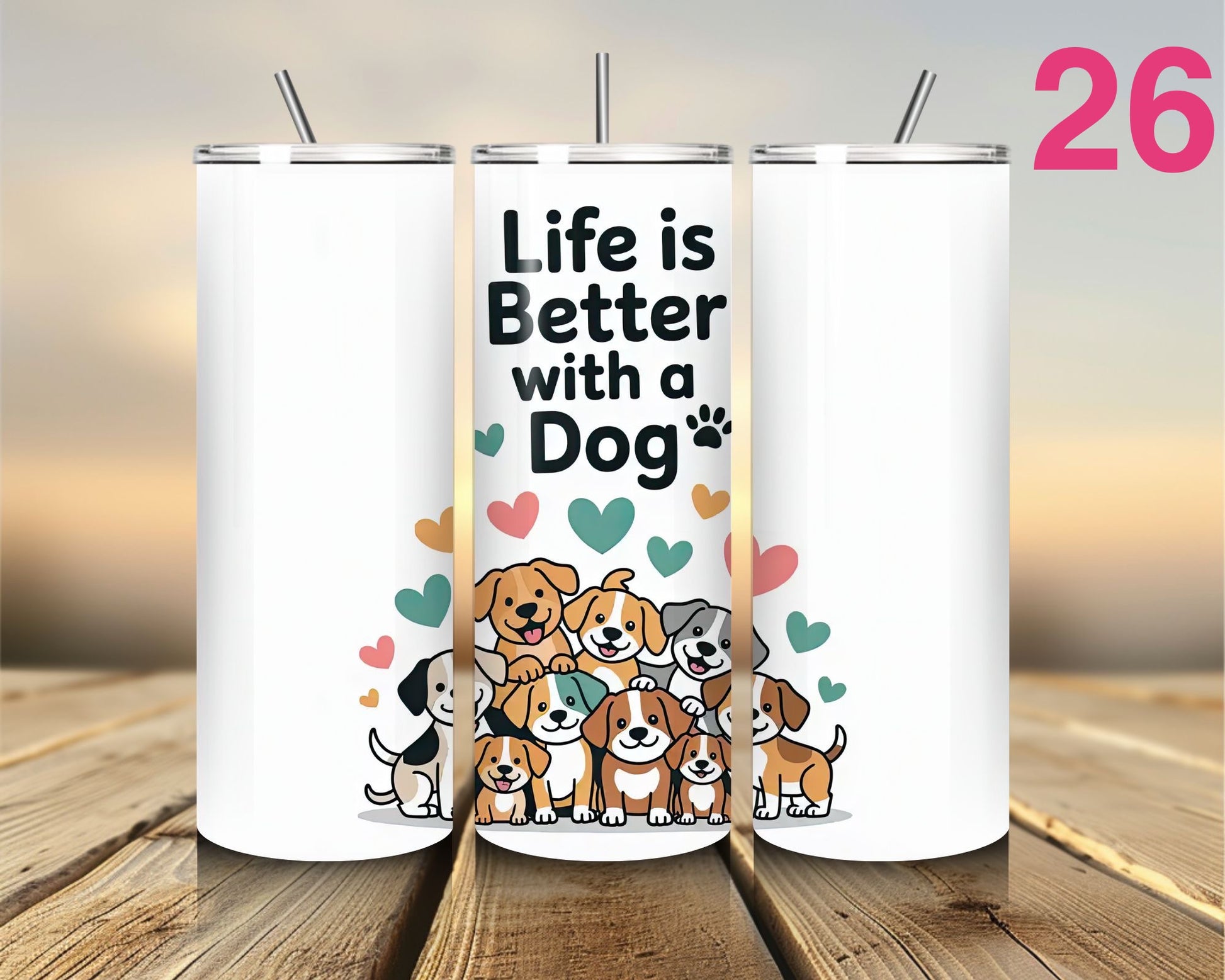 Three white tumblers with dog-themed designs on a wooden surface.