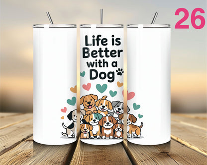 Three white tumblers with dog-themed designs on a wooden surface.