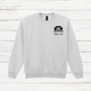 Gray sweatshirt with a dog graphic and text on a white wooden background