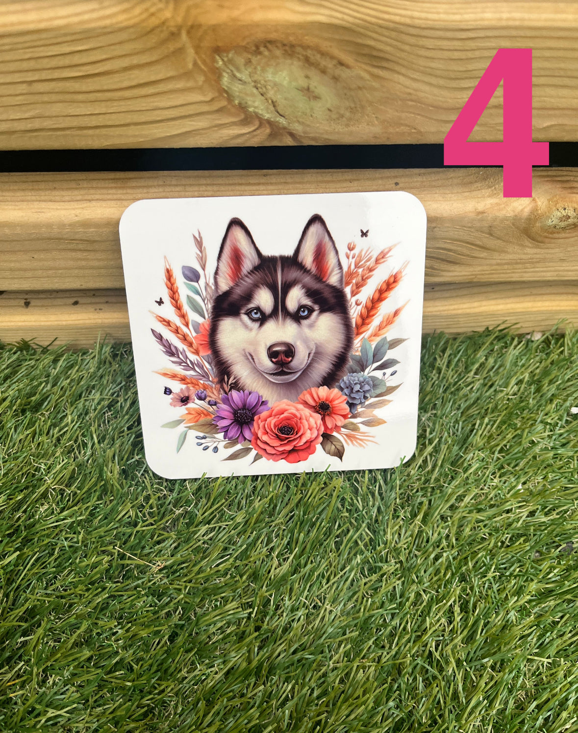 Coaster with a dog illustration and floral design on grass