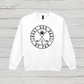 White sweatshirt with 'Best Dog Dad by Par' text on a wooden surface
