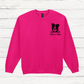 Pink sweatshirt with a black dog illustration and 'Bella's Mum' text on a white wooden background