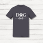 Gray t-shirt with 'Dog Dad' text on a wooden surface