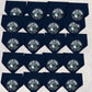 Multiple black dog bandanas with a central logo on a light gray background