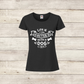 Black t-shirt with 'Life is better with a dog' text on a wooden background