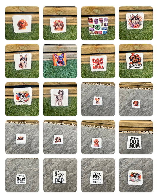 Set of dog-themed coasters with various designs on a wooden and stone surface.