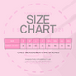 Size chart for clothing with chest measurements on a pink background, featuring the brand 'PAWSITIVELY'.