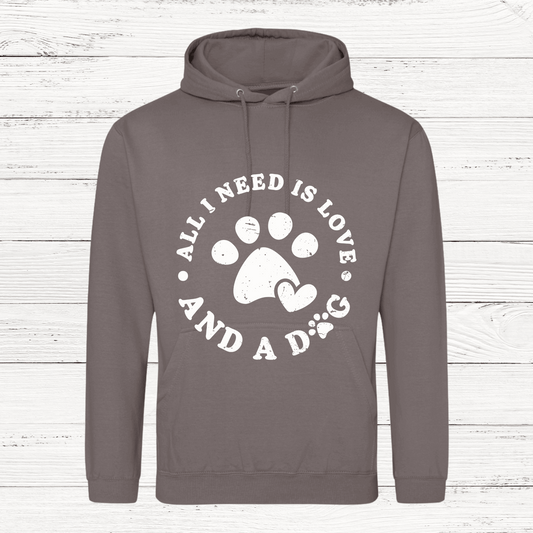 White hoodie with All I Need Is Love and a Dog design