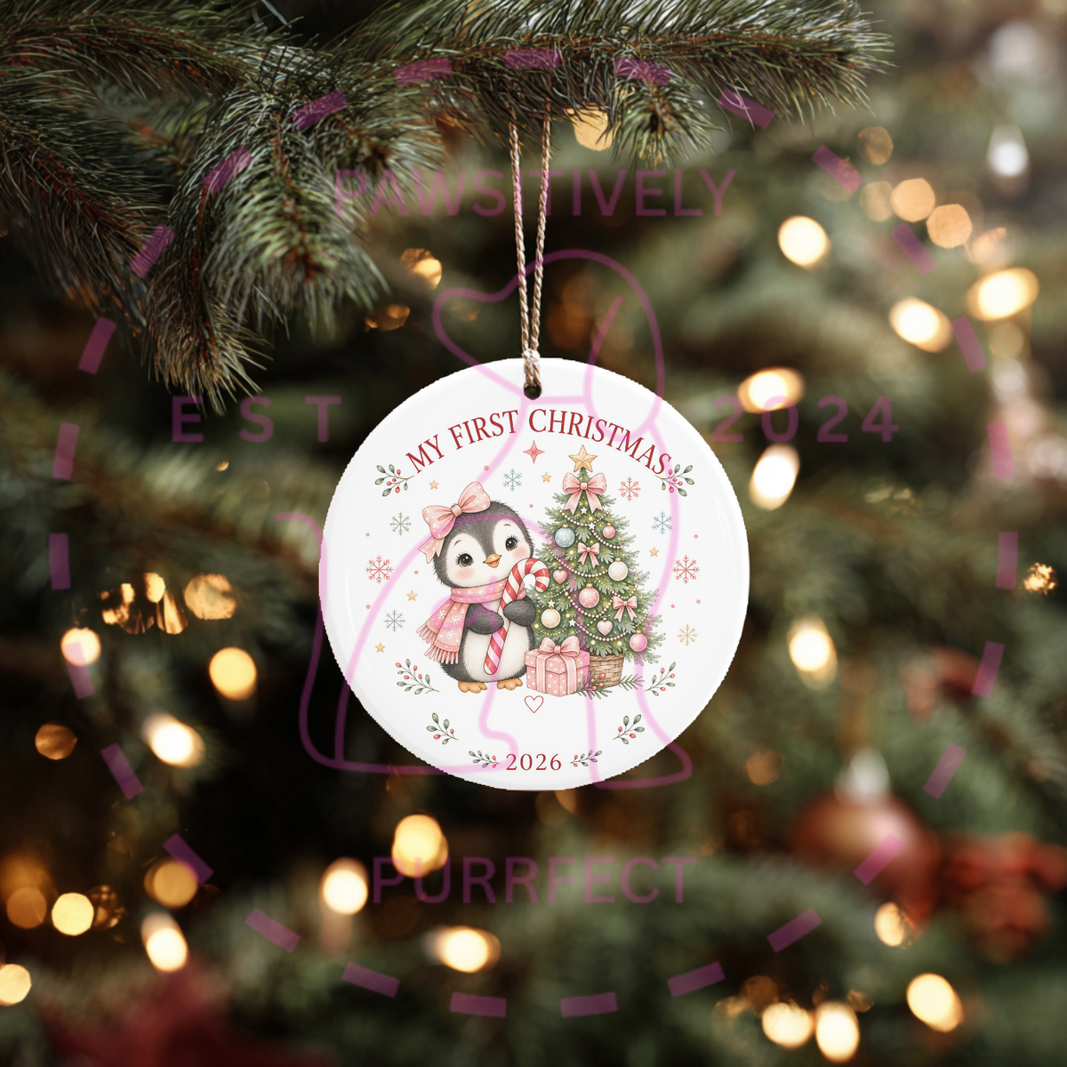 Custom baby photo Christmas ornament hanging on a tree.