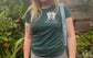 Green women's T-shirt with personalised white peeking dog outline