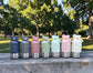 Hydra Paws Bottles in a row