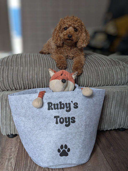 Personalised pet toy bag with paw print design